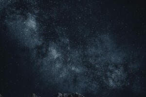 Star-filled night sky over mountains Starry sky with Milky Way over mountains